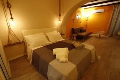 Letto o letti in una camera di La 'NZIRIA
