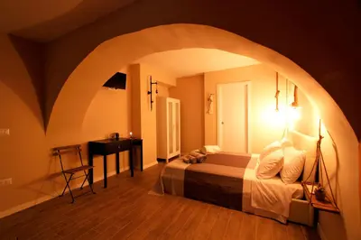 Letto o letti in una camera di La 'NZIRIA