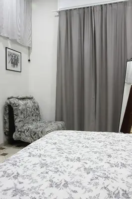 Letto o letti in una camera di Fira's home
