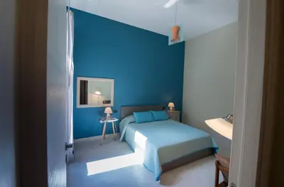 Letto o letti in una camera di Duomo Regina Apartments