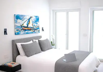 Letto o letti in una camera di Fiorentini Residence NAPOLI