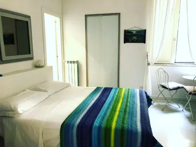 Letto o letti in una camera di Le Stanze di Dolly