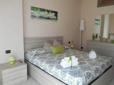 Letto o letti in una camera di La Collina di Parthenope Vomero