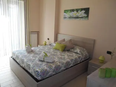 Letto o letti in una camera di La Collina di Parthenope Vomero