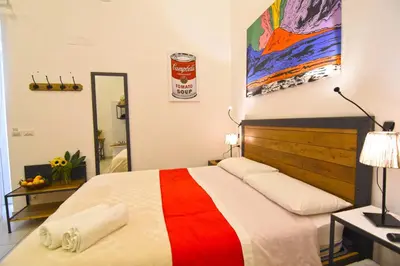 Letto o letti in una camera di B&B Ninarella Napoli