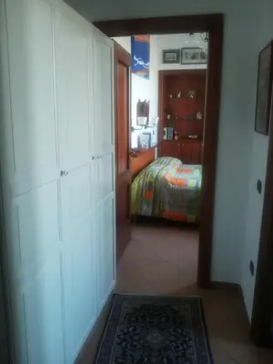 Letto o letti in una camera di A wonderful penthouse in Naples