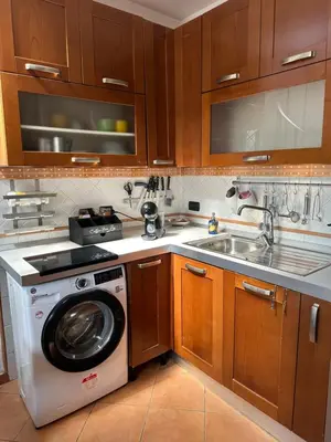 Cucina o angolo cottura di A wonderful penthouse in Naples