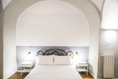Letto o letti in una camera di Il Loggiato by Wonderful Italy