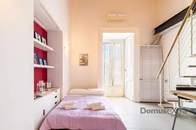 Letto o letti in una camera di Vicerè Apartments By DomusExtra