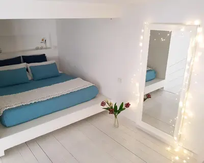 Letto o letti in una camera di Mare Napoli