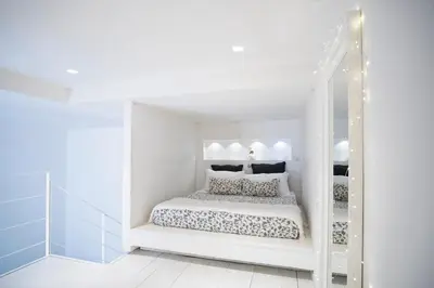 Letto o letti in una camera di Mare Napoli