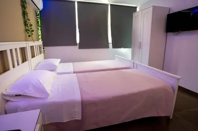 Letto o letti in una camera di Palazzo 15 Napoli