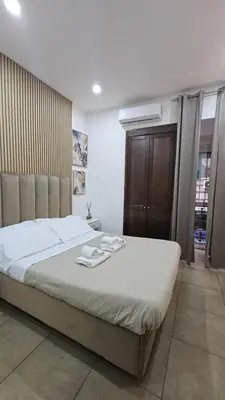 Letto o letti in una camera di B&B Napoli Centrale Room&Jacuzzi