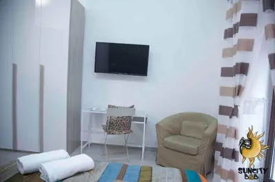 TV o dispositivi per l'intrattenimento presso Suncity B&B