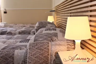 Letto o letti in una camera di Annarè Home Holiday