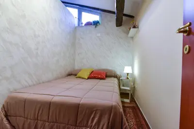 Letto o letti in una camera di La Mansarda