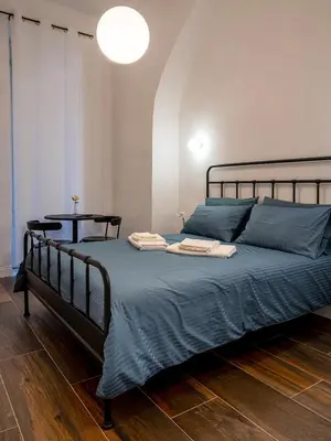 Letto o letti in una camera di Residenza Spinelli