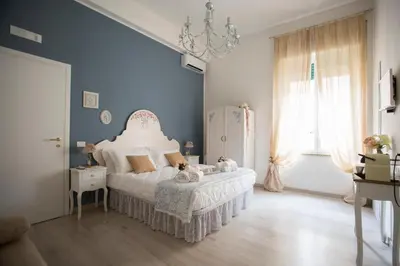 Letto o letti in una camera di La Maison Romantique