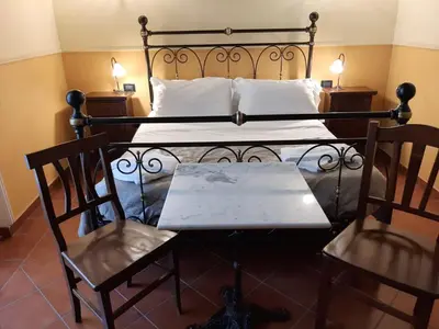 Letto o letti in una camera di Hotel PIGNATELLI Napoli
