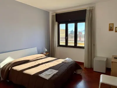 Letto o letti in una camera di B&B Le Stelle del Museo