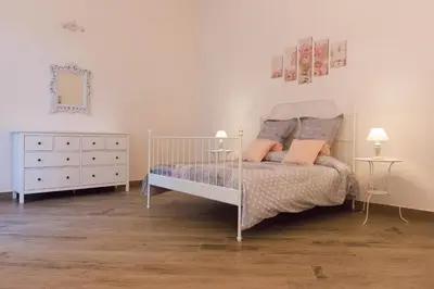 Letto o letti in una camera di Maison la Mitra - Dimore Partenopee