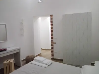 Letto o letti in una camera di Il Tesoro di SanGennaro