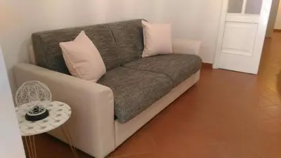 Area soggiorno di Anna Home in Chiaia Unica sede