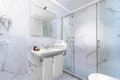 Bagno di La Fontanina Suites
