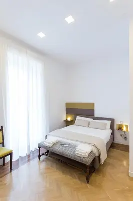Letto o letti in una camera di Savoy Riviera