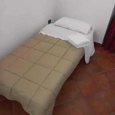 Letto o letti in una camera di Home Marty