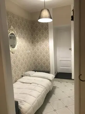Letto o letti in una camera di Borgo Santa Lucia Apartment