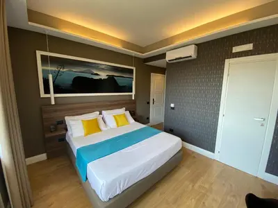 Letto o letti in una camera di 7th Floor Suite