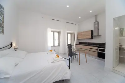 Letto o letti in una camera di Eugenia e Donato