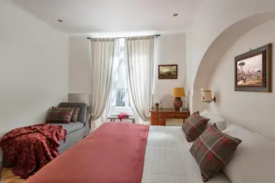 Letto o letti in una camera di Weekend a Napoli