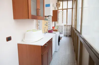 Cucina o angolo cottura di Maman Suite, city center near Molo Beverello