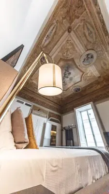 Letto o letti in una camera di Relais Della Porta