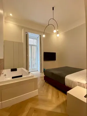 Letto o letti in una camera di Relais Della Porta