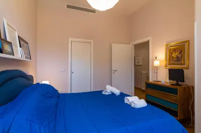Letto o letti in una camera di Elegant Flat at Municipio by Napoliapartments