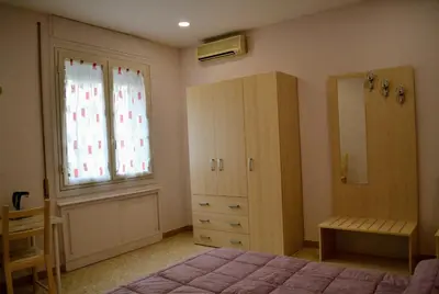 Letto o letti in una camera di Le Sirene
