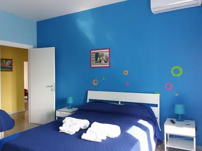 Letto o letti in una camera di B&B Napoli Leggendaria