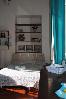 Letto o letti in una camera di Casa Luperano