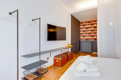 Letto o letti in una camera di ALMA de Toledo Design Home Plebiscito