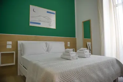 Letto o letti in una camera di Napoli Central Gate