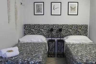 Letto o letti in una camera di Casa Avallone
