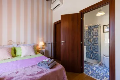 Letto o letti in una camera di Casa Vacanze Sapienza 29