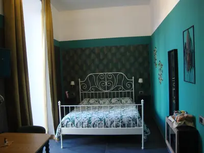 Letto o letti in una camera di La Stanza a parte