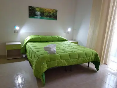 Letto o letti in una camera di Napul'è