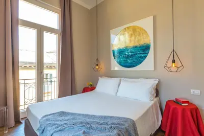 Letto o letti in una camera di Residenza Trinità Maggiore