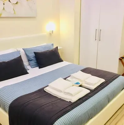 Letto o letti in una camera di Da Polly a Piazza Amedeo