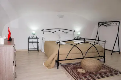 Letto o letti in una camera di Vecchia Napoli apt 20